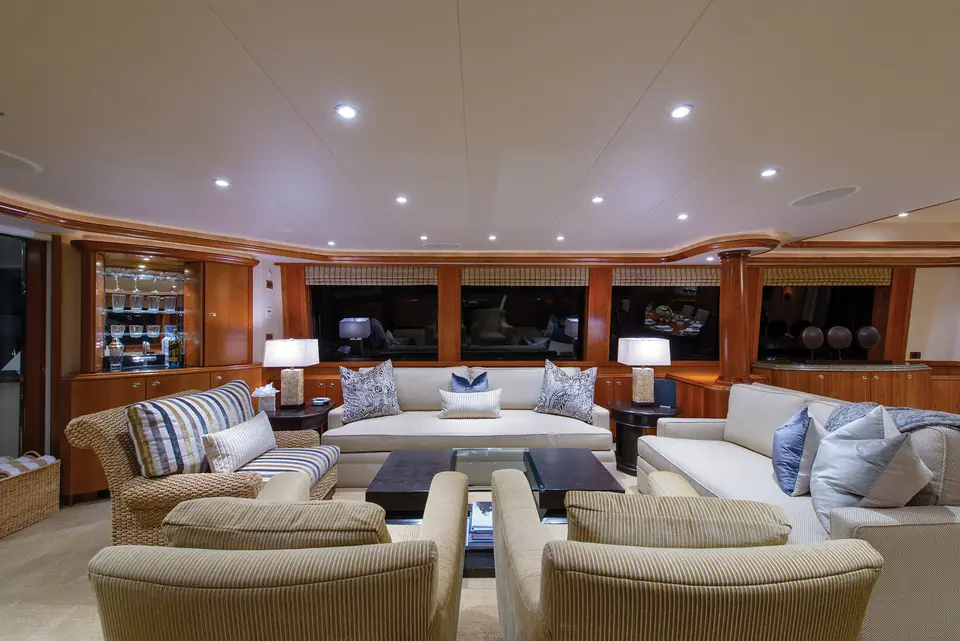 Westport 112 saloon with cream sofas and armchairs, cherry joinery and wide windows