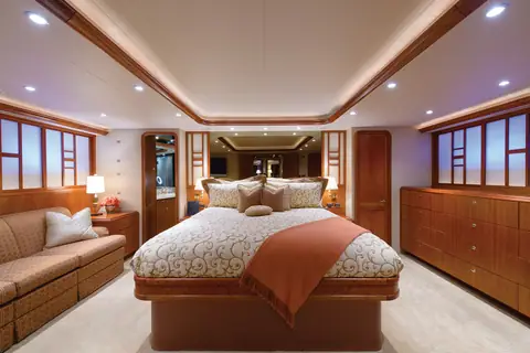 Full beam master stateroom aboard the Westport 112 Southern Star with a king berth