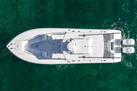 Overhead view of a Yellowfin 32 Offshore showing the bow seating, console and twin outboards