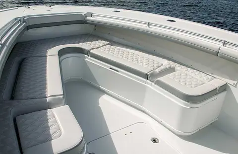 Yellowfin 34 Offshore wraparound bow seating with quilted gray cushions